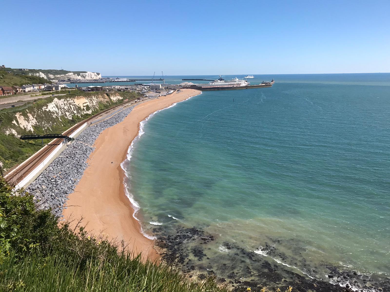 Walking a trail on beside the beach 